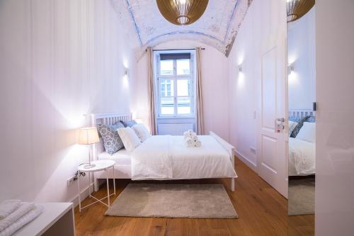 Posteľ alebo postele v izbe v ubytovaní Deluxe Apartment Talia