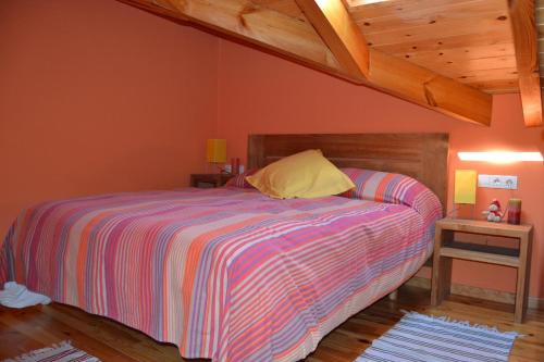 Postel nebo postele na pokoji v ubytování Dúplex en el centro de Alp