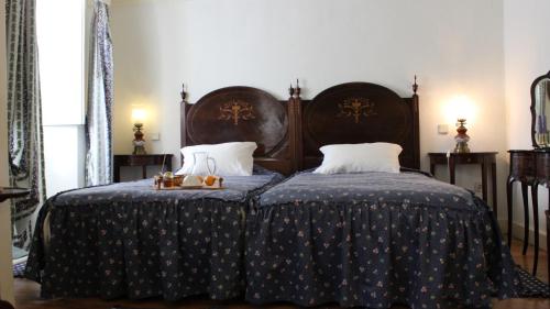 Ліжко або ліжка в номері Quinta da Comenda