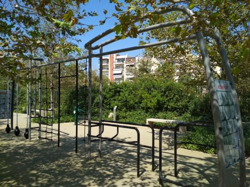 an empty playground in a park at George's Apartment in Athens