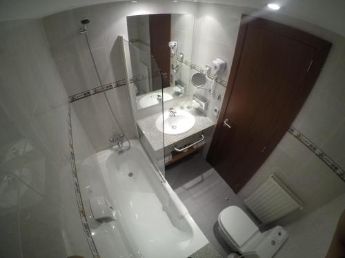 Ένα μπάνιο στο Apartamentos Turísticos Roc Del Castell