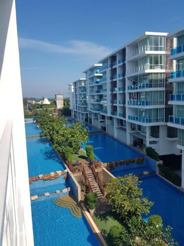 an aerial view of a river in front of a building at My Resort Condo Hua Hin By Hua Hin Hip in Hua Hin