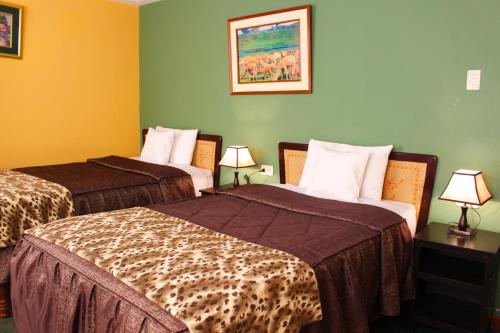 En eller flere senge i et værelse på La Posada del Colca