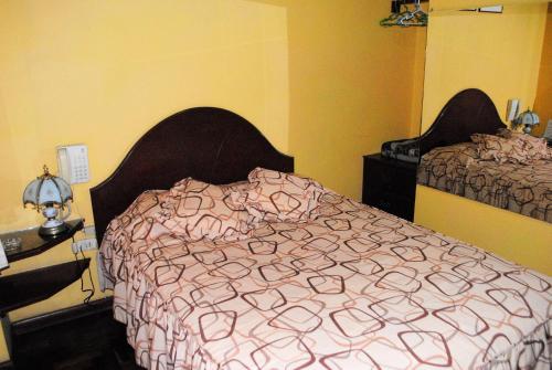 Postel nebo postele na pokoji v ubytování Hotel SKY