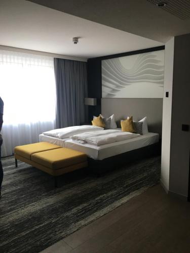 Postel nebo postele na pokoji v ubytování Kranz Parkhotel