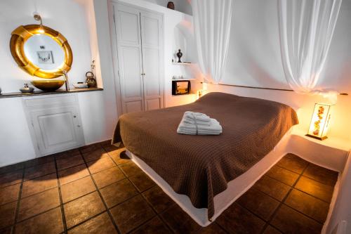 Afroessa Hotel by Pearl Hotel Collectionにあるベッド