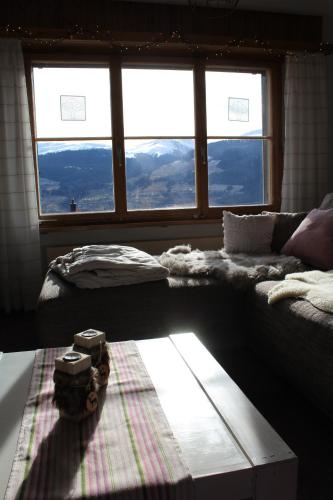 Una cama o camas en una habitación de Arnika Montana