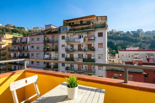 a balcony with a bench and a building at Culture Residence Consalvo Otto in Naples