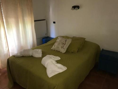 A bed or beds in a room at La picada