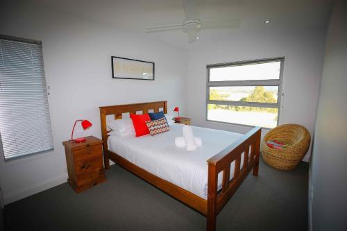 Ένα ή περισσότερα κρεβάτια σε δωμάτιο στο Pindara