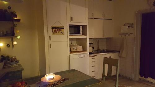 Кухня или мини-кухня в Villa Vuorenpää
