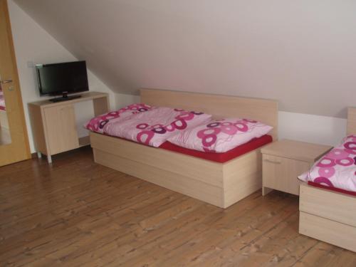 
Posteľ alebo postele v izbe v ubytovaní Aqua Spa Ganovce
