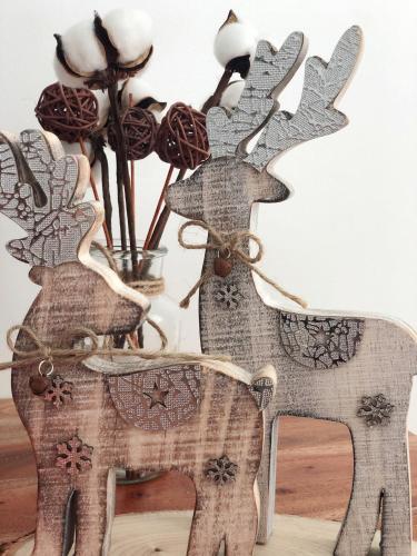 a pair of reindeer decorations on a table at 1949 Dreamy Home in Panglao