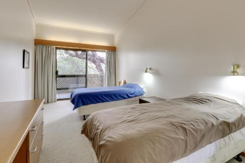 Ein Bett oder Betten in einem Zimmer der Unterkunft Korak