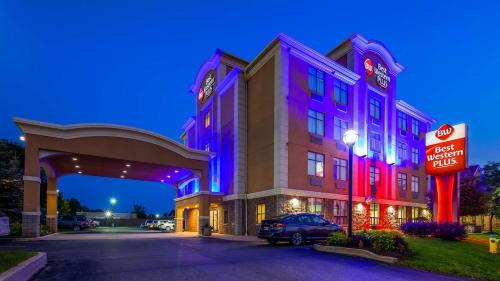 a hotel with a sign in front of a building at Best Western Plus Barrie in Barrie