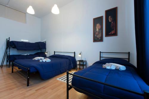 Krevet ili kreveti u jedinici u okviru objekta Grand Bijoux Torino Centrale