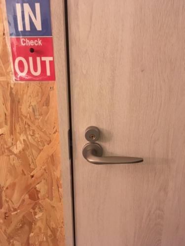 a sign on a door with a sign on it at Cloud Sharing Hotel Hakata 1 Guesthouse Dormitory in Fukuoka