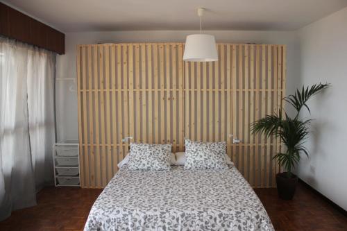מיטה או מיטות בחדר ב-TRAVELLER EL POSTIGUET