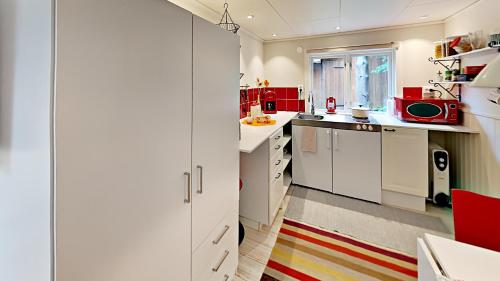 Η κουζίνα ή μικρή κουζίνα στο Woodstock B&B & Studio Apartments