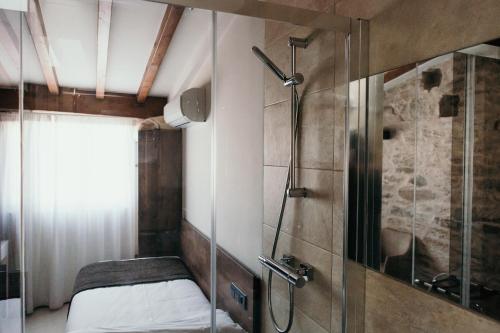 Ett badrum på Via Aetcal Hotel & Wellness