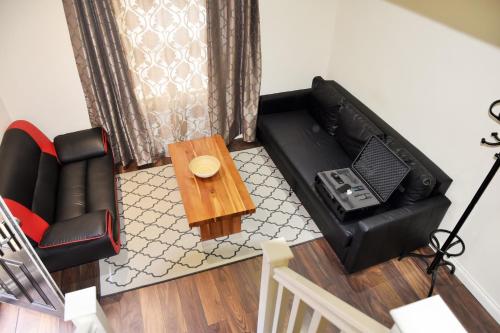 Ein Sitzbereich in der Unterkunft Luxury Duplex Apartment
