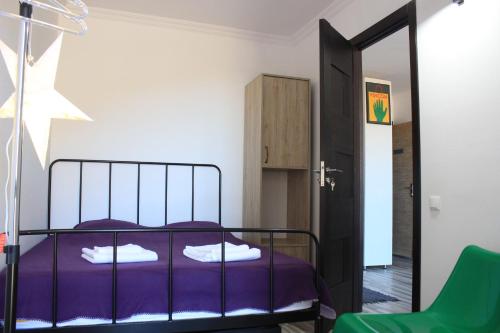 Postel nebo postele na pokoji v ubytování Studio-Hotel Loft Gudauri