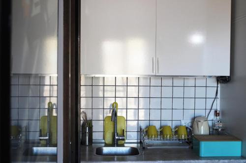 Kuchyň nebo kuchyňský kout v ubytování Studio-Hotel Loft Gudauri