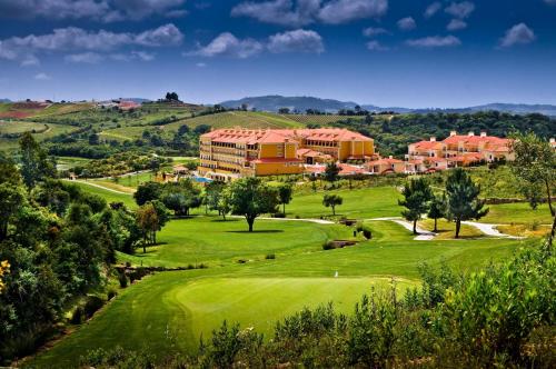 a view of the golf course at a resort at Dolce CampoReal Lisboa in Turcifal