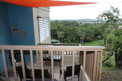 a view from the balcony of a house at Casa Campo y mis Memorias-2ND LEVEL-with pool in Hormigueros