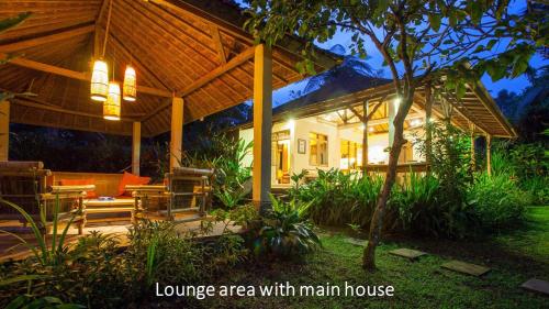 a house with a large area with main house at Carik Tangis Boutique Homestay in Jatiluwih