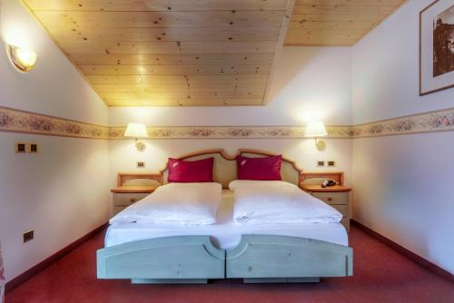 Cama o camas de una habitación en Albergo Alla Rosa