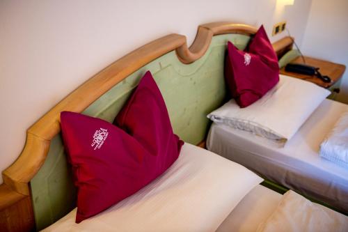 Cama o camas de una habitación en Albergo Alla Rosa