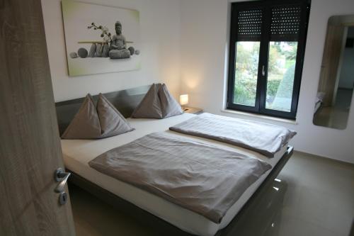 Cama ou camas em um quarto em Penthouse No6