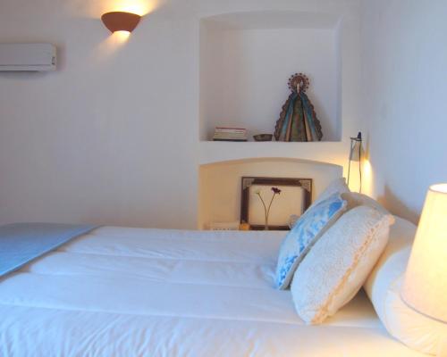 Postel nebo postele na pokoji v ubytování Monte do Alentejo | Cozy Cottage