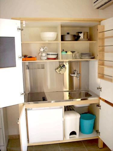 a kitchen with a sink and a counter at Agriturismoteo in Bernalda