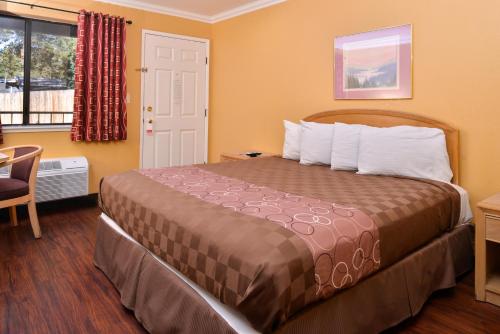Ένα ή περισσότερα κρεβάτια σε δωμάτιο στο Americas Best Value Inn and Suites Clearlake