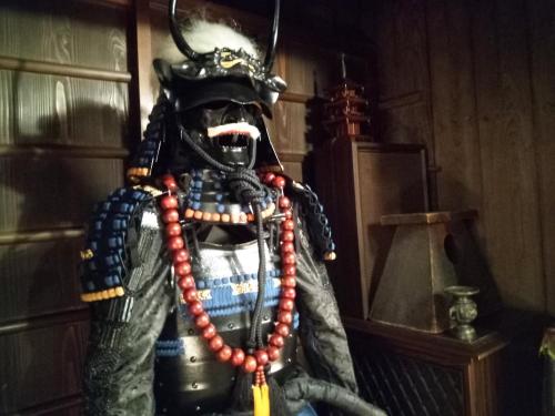 a statue of a samurai wearing a helmet and beads at Kyoto Villa Ninja in Kyoto