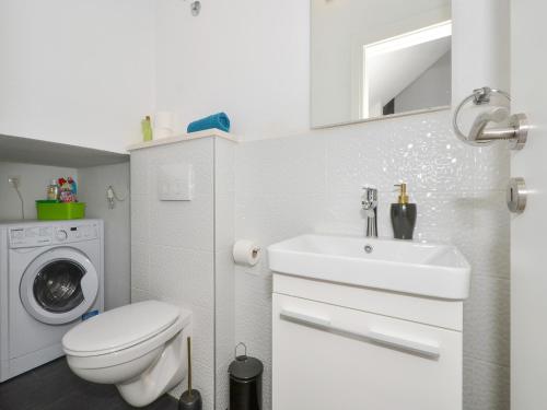 Koupelna v ubytování Deluxe Apartman Porto