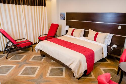 מיטה או מיטות בחדר ב-Verona Hotel Baños Turcos