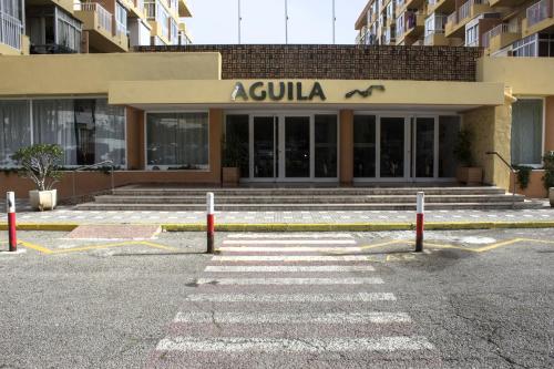 a cullala building with a caution tape in front of it at Apartamento Aguila in Benalmádena