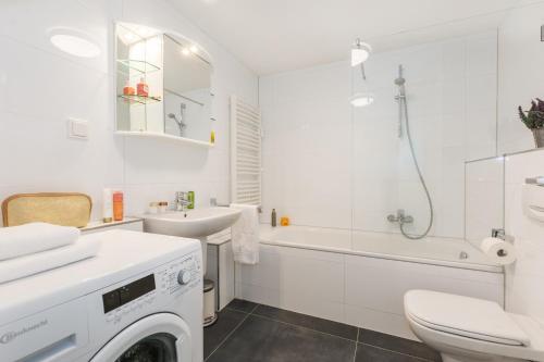 Ένα μπάνιο στο Ferienwohnung Zum Kliff