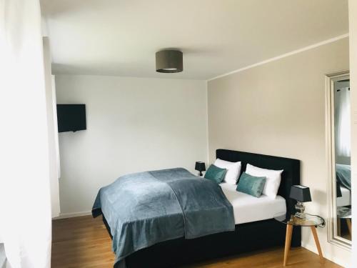 Ένα ή περισσότερα κρεβάτια σε δωμάτιο στο Ferienhaus Albert