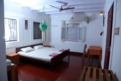 Ліжко або ліжка в номері Ocean Green Kerala