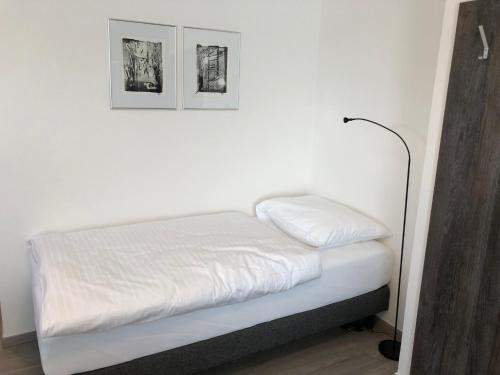 Ένα ή περισσότερα κρεβάτια σε δωμάτιο στο KM Hotel Murtal
