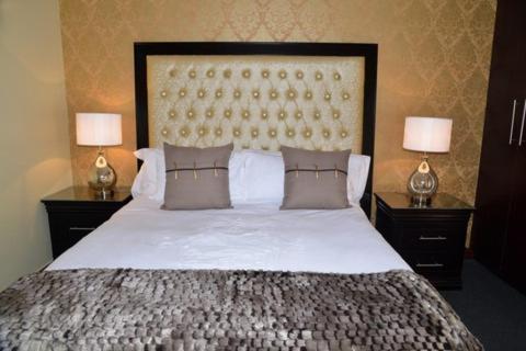 Ένα ή περισσότερα κρεβάτια σε δωμάτιο στο Soul Discovery Boutique Hotel & Spa