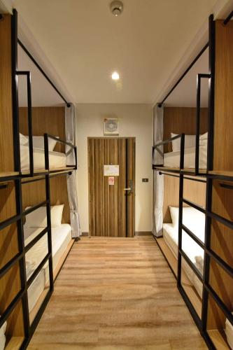 Ένα ή περισσότερα κρεβάτια σε δωμάτιο στο Lana Beds & Space
