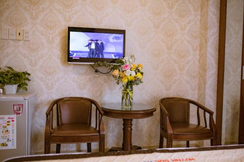 Huynh Duc Hotelにあるテレビまたはエンターテインメントセンター