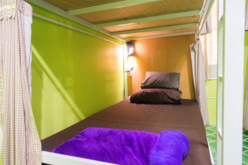 Postel nebo postele na pokoji v ubytování Plus Hostel Ayutthaya