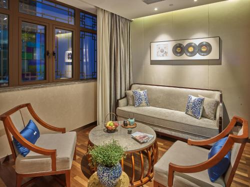 Posezení v ubytování SSAW Boutique Hotel Nanjing Grand Theatre