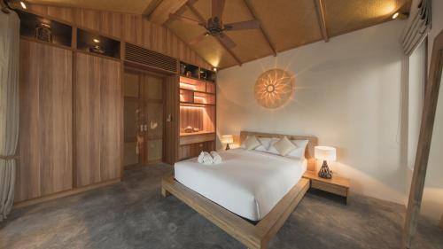 Ліжко або ліжка в номері Cho Fah Residence